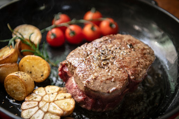 Cooking a steak food photography recipe idea