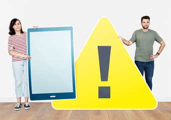 People holding icons in the theme of internet security