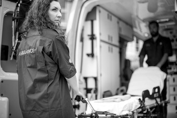 Fototapeta premium Paramedics at work with an ambulance