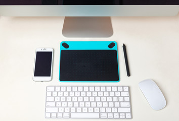 laptop and mobile phone on white background