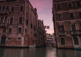 Fototapeta na wymiar Canals view in Venice at sunset