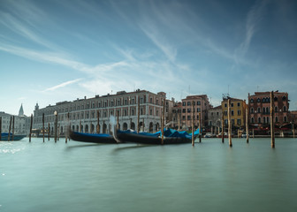 Fototapeta premium View on Gondola parking in grand canal venice,long exposure shot
