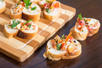 Home made bruschetta on cutting board