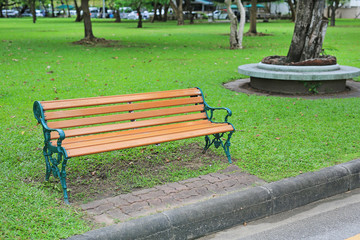 Green chairs in the public park. Feel lonely and peaceful.