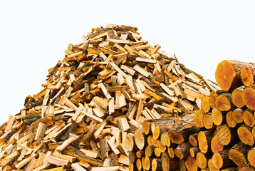 Stack of chopped firewood isolated on a white background . Preparation of firewood for the winter