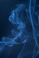 Abstract blue smoke swirls