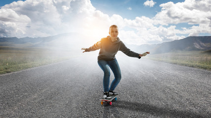 Fototapeta na wymiar Teenager girl ride her skateboard. Mixed media