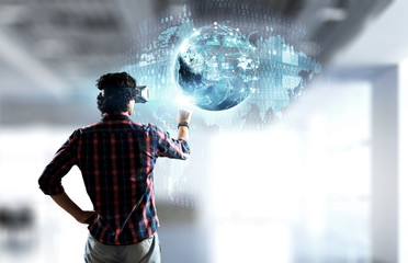 Experiencing virtual technology world. Mixed media