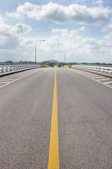 Fototapeta premium road on the bridge and many cloud in sky