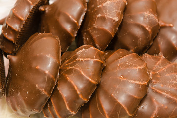 Fresh marshmallows in dark chocolate. Baby sweets. Diet sweets. Egg white. Delicious pastry.