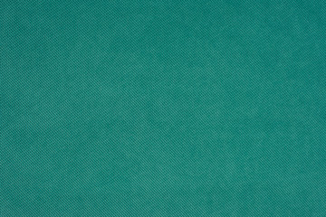 Green fabric texture background.