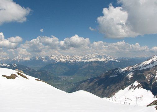 Spring Alps landscape with mountains and blue sky