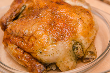 Fried chicken lies on a plate. Fried chicken with spices.