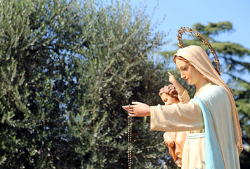statue of the Madonna during a procession