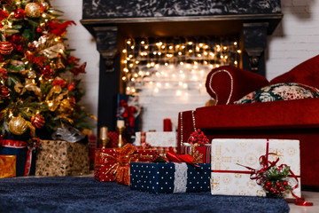 beautiful black fireplace with Christmas Garland