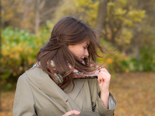 girl on a windy autumn day