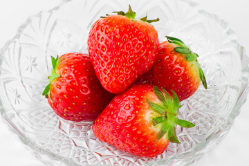 Fresh strawbery in the beautiful glass.