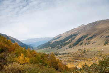 Autumn landscape in the mountains of the Caucasus. Russia, Karachay-Cherkess Republic, near the settlement of Arkhyz