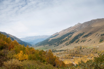 Fototapeta na wymiar Autumn landscape in the mountains of the Caucasus. Russia, Karachay-Cherkess Republic, near the settlement of Arkhyz