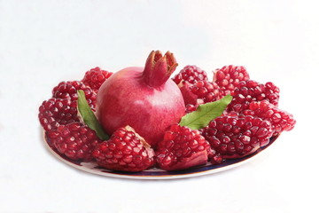 ripe, red pomegranates grown in the garden