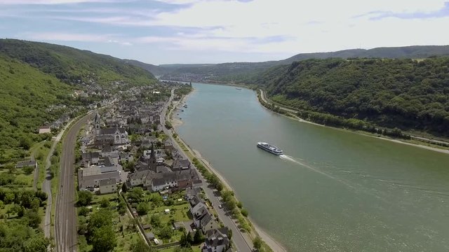 Timelapse of a ship on a river.