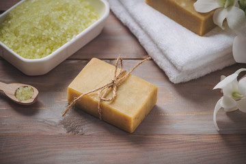 Natural handmade soap bar and orchid on white background