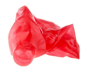 red condom isolated on white background