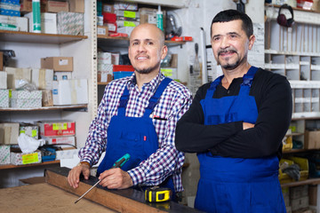 middle aged professional workers  at factory