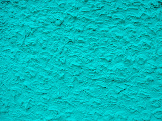 Abstract colorful light blue painted  rough cement wall texture and background