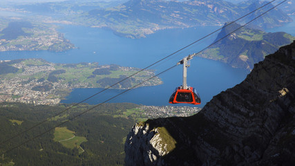 Cable car descending in the Swisse Alps.