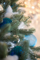 Christmas tree in interior. Christmas background. closeup shot. blurred background