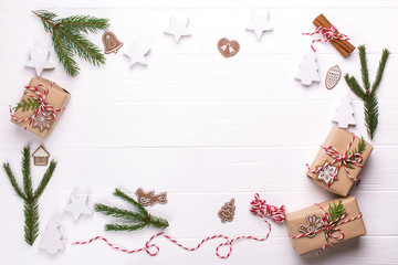 White christmas background. Frame with Christmas gift boxes collection, decorations and pine tree,...