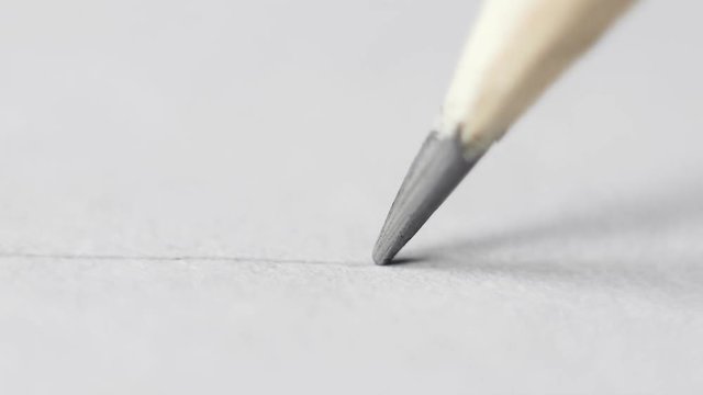 Designer makes pencil sketches on paper