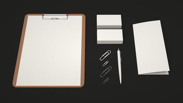 Clipboard, business cards, leaflet, paper clips and pen