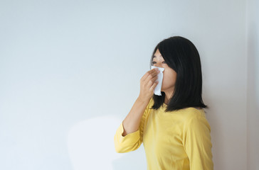 Asian woman with allergy symptoms problem,Female got nose sneezing