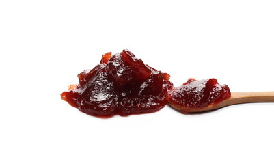 Strawberry jam, marmalade with wooden spoon isolated on white background and texture
