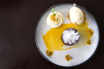 Valrhona chocolate moelleux or molten cake with passion fruit