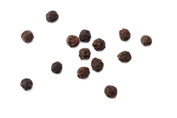 Black peppercorn isolated on white background. top view