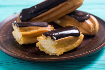 French dessert eclair with chocolate .