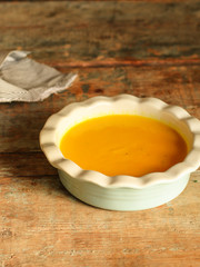 pumpkin and carrot soup (orange cream soup). Healthy food. Copy space. Diet menu. Top view