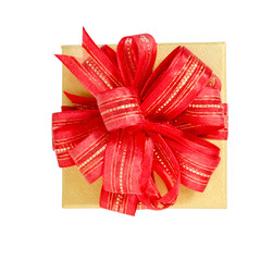 Gift box wrapped in brown recycled paper with red ribbon bow top view isolated on white background.