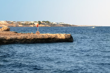Naklejka premium Beautiful view of rock pier in the sea