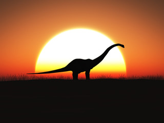 3D rendering of a dinosaur standing against a big sun at sunset.