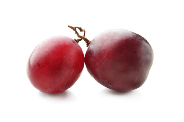 Ripe sweet grapes on white background