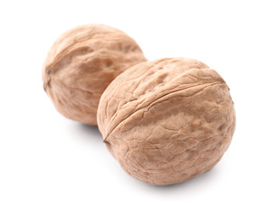Tasty walnuts on white background
