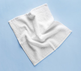 Clean soft towel on color background