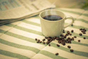 Cup of hot coffee with vintage color effected