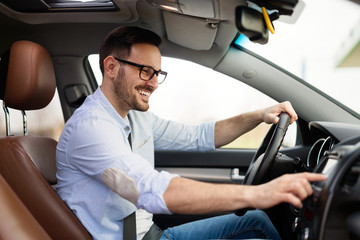 Man Using Gps Navigation System In Car to travel