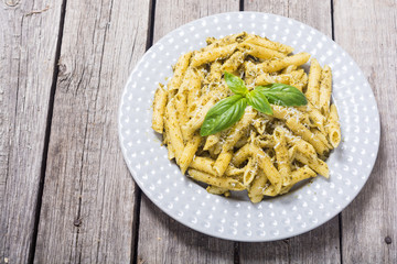 Italian penne pasta with sauce pesto