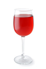 Glass of tasty wine on white background